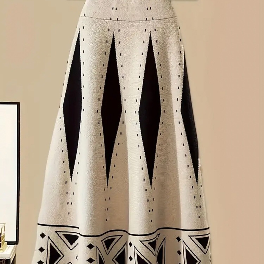Two piece woolen skirt and sweater with geometric patterns.